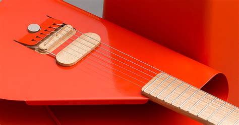 sheet metal guitar|This Designer Guitar Is Made From a Bent Sheet of Steel.